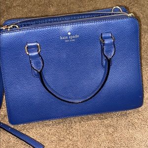 Slightly used blue Kate Spade purse.